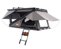 Summit XLZ 1550 twin-fold hardshell rooftop tent open with ladder and rainfly