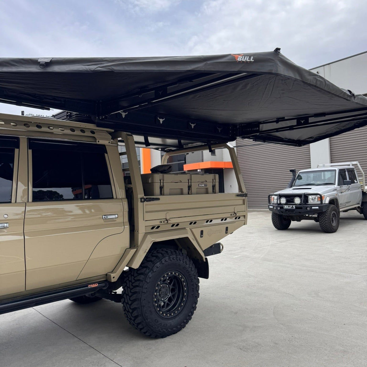 Bull Proof 180 awning arm with bull head detailing and 320GSM canvas over a Land Cruiser